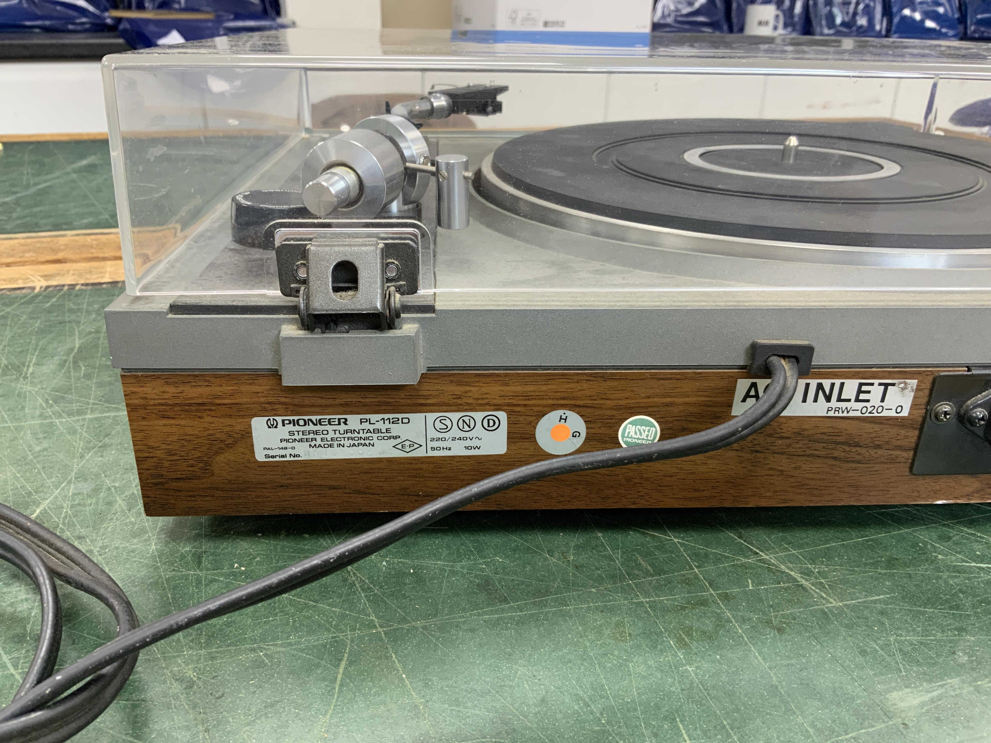 Two record players; a Philips 437 turntable together with a Pioneer PL-112D turntable, both with leads. Condition - fair to good